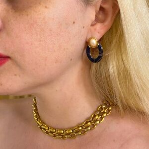 Vintage doorknocker earrings.